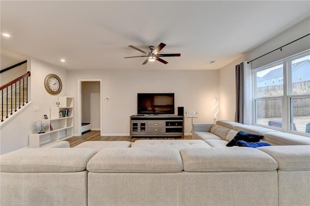 5452 Fountainhead Ln, Auburn, GA 30011 - living area with stairs, a ceiling fan, baseboards, recessed lighting, and wood finished floors