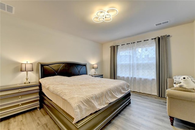 5452 Fountainhead Ln, Auburn, GA 30011 - bedroom featuring visible vents and wood finished floors