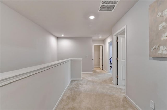 5452 Fountainhead Ln, Auburn, GA 30011 - hallway featuring visible vents, light carpet, baseboards, recessed lighting, and an upstairs landing