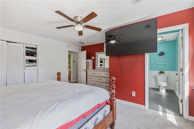 1433 Janice Ct SW, Lilburn, GA 30047 - bedroom featuring a closet, ceiling fan, and ensuite bathroom