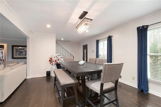 dining space with stairs, dark wood finished floors, and a healthy amount of sunlight