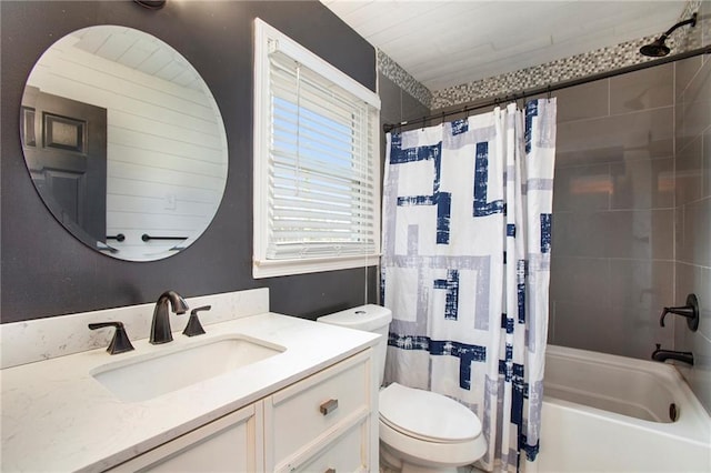 full bathroom with vanity, toilet, and shower / tub combo with curtain