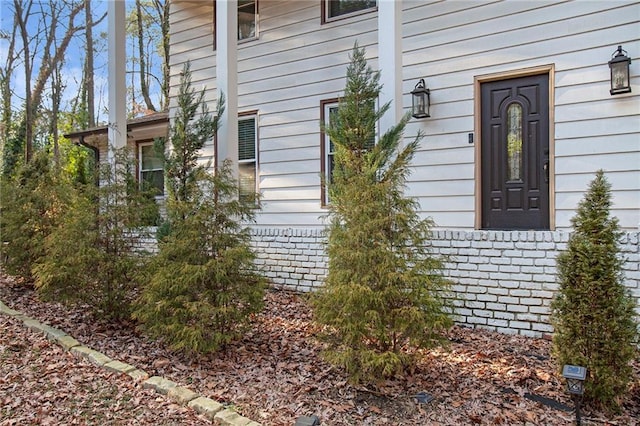 view of home's exterior featuring brick siding