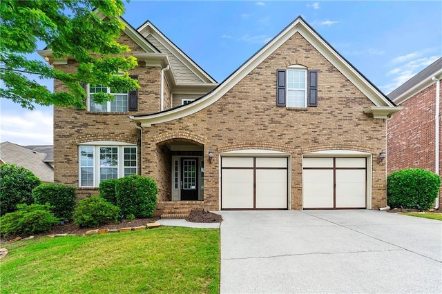 4677 Prater Way SE, Smyrna, GA 30080 - traditional home featuring driveway, a garage, brick siding, and a front lawn