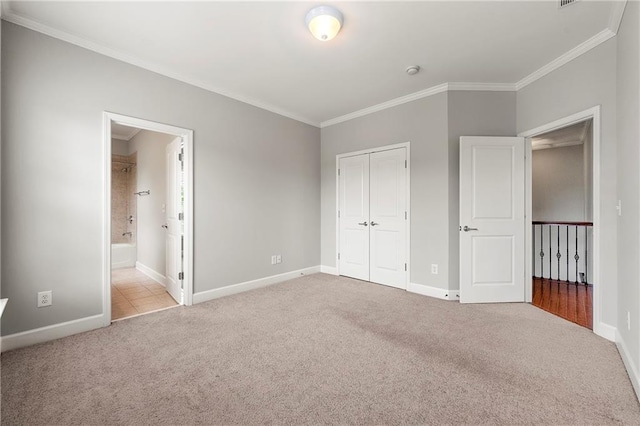 4677 Prater Way SE, Smyrna, GA 30080 - unfurnished bedroom with carpet flooring, ornamental molding, a closet, and baseboards