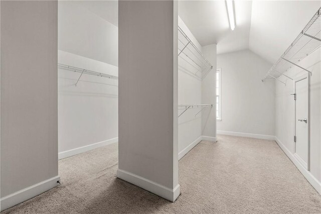 4677 Prater Way SE, Smyrna, GA 30080 - walk in closet featuring carpet and lofted ceiling