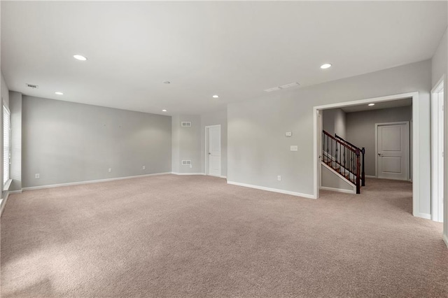 4677 Prater Way SE, Smyrna, GA 30080 - spare room featuring light colored carpet, recessed lighting, baseboards, and stairway