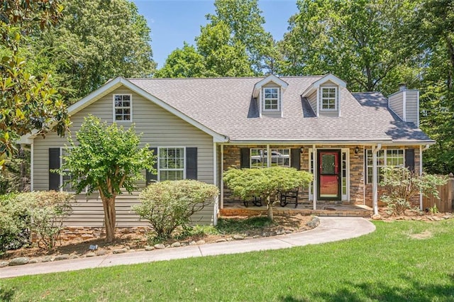 115 Oak Crest Ln, Dallas, GA 30132 - cape cod house featuring a shingled roof, a chimney, stone siding, and a porch