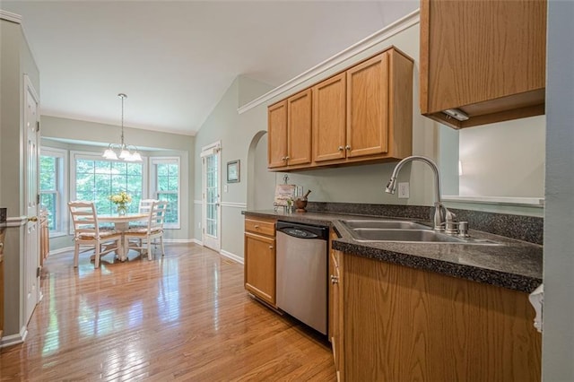 115 Oak Crest Ln, Dallas, GA 30132 - kitchen featuring stainless steel dishwasher, vaulted ceiling, light wood-style flooring, dark countertops, and baseboards