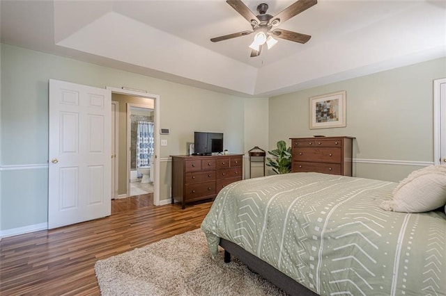 115 Oak Crest Ln, Dallas, GA 30132 - bedroom with wood finished floors, a raised ceiling, baseboards, and a ceiling fan