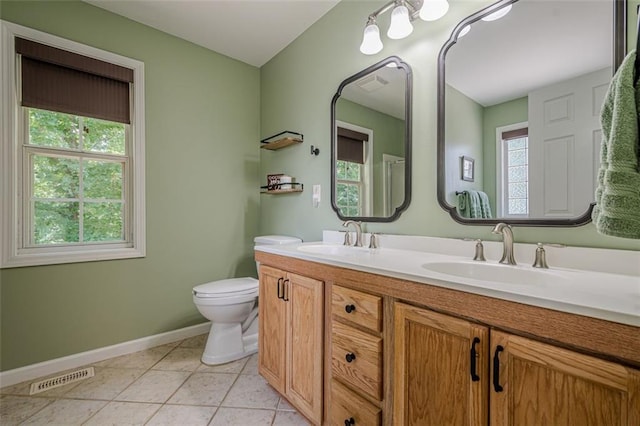 115 Oak Crest Ln, Dallas, GA 30132 - bathroom featuring baseboards, toilet, tile patterned flooring, and double vanity