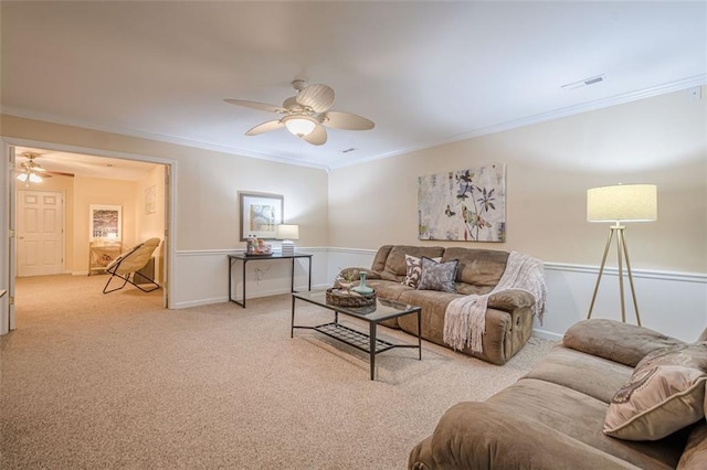 115 Oak Crest Ln, Dallas, GA 30132 - living room featuring ceiling fan, crown molding, light carpet, and a wainscoted wall