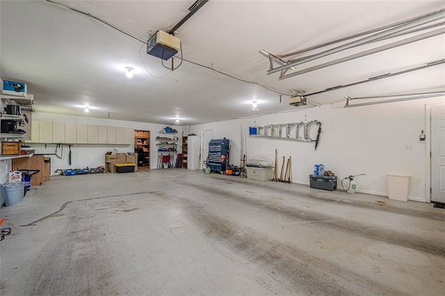115 Oak Crest Ln, Dallas, GA 30132 - garage featuring a garage door opener