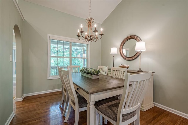 115 Oak Crest Ln, Dallas, GA 30132 - dining room featuring vaulted ceiling, arched walkways, wood finished floors, a chandelier, and baseboards