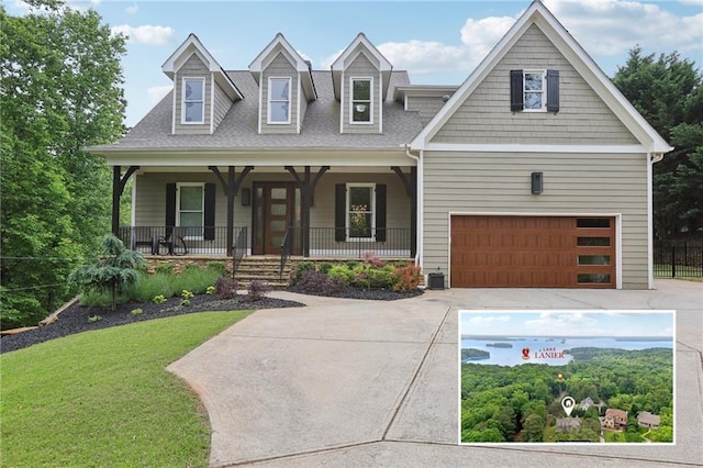 7540 Shadburn Ferry Rd, Cumming, GA 30041 - view of front of property featuring driveway, covered porch, a front lawn, a shingled roof, and a garage