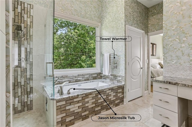 7540 Shadburn Ferry Rd, Cumming, GA 30041 - full bath featuring wallpapered walls, a garden tub, vanity, and tile patterned flooring