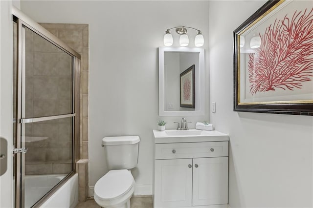 7540 Shadburn Ferry Rd, Cumming, GA 30041 - full bath featuring shower / bath combination with glass door, vanity, and toilet