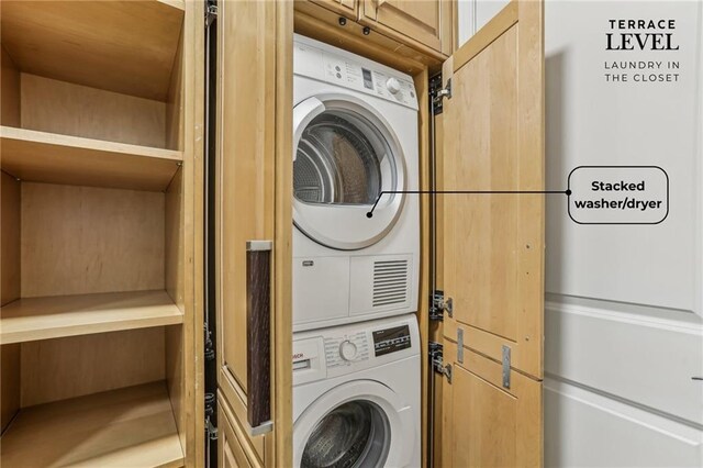 7540 Shadburn Ferry Rd, Cumming, GA 30041 - laundry area with stacked washer / dryer