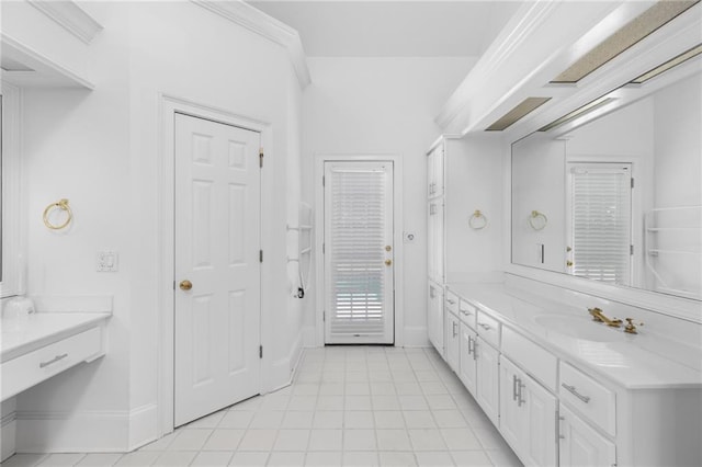 bathroom featuring tile patterned flooring and vanity
