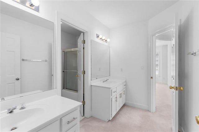 bathroom featuring dual bowl vanity