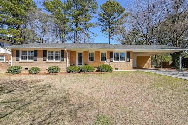 single story home with brick siding, a front yard, crawl space, an attached carport, and driveway