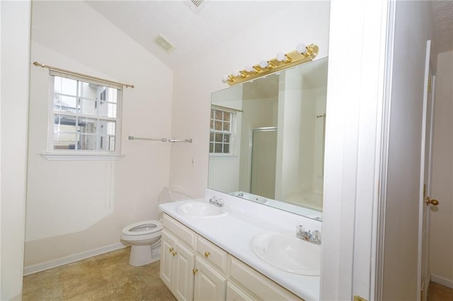 bathroom featuring vanity, an enclosed shower, vaulted ceiling, and toilet