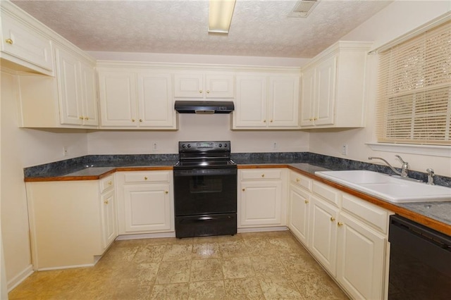 kitchen with sink, a textured ceiling, and black appliances