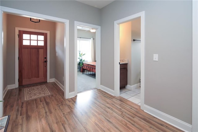 foyer with light wood-type flooring