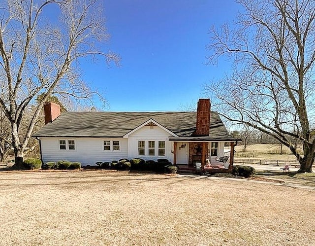 ranch-style house featuring a porch