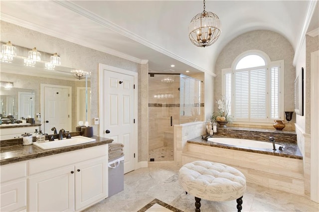 bathroom featuring a notable chandelier, vanity, ornamental molding, and independent shower and bath