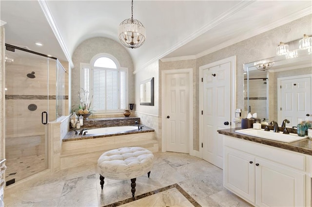 bathroom featuring shower with separate bathtub, vanity, an inviting chandelier, and vaulted ceiling