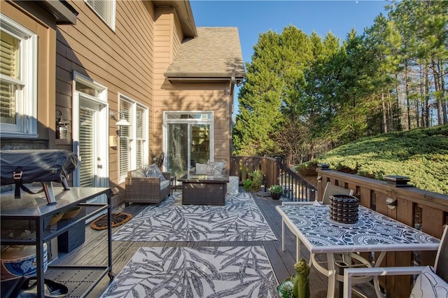 view of patio / terrace with an outdoor living space and a deck