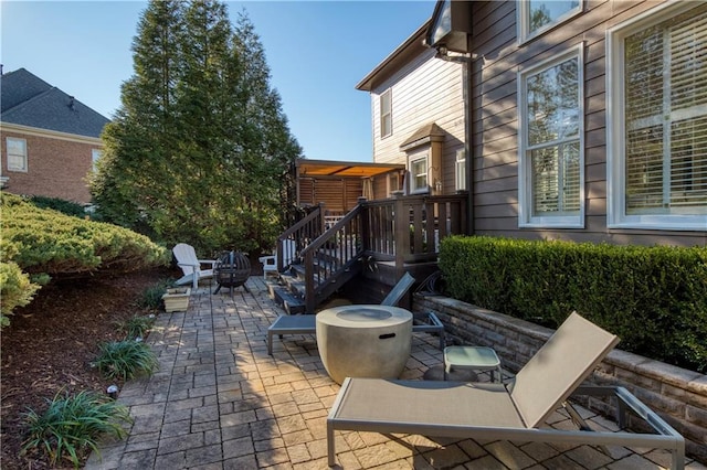 view of patio featuring a fire pit