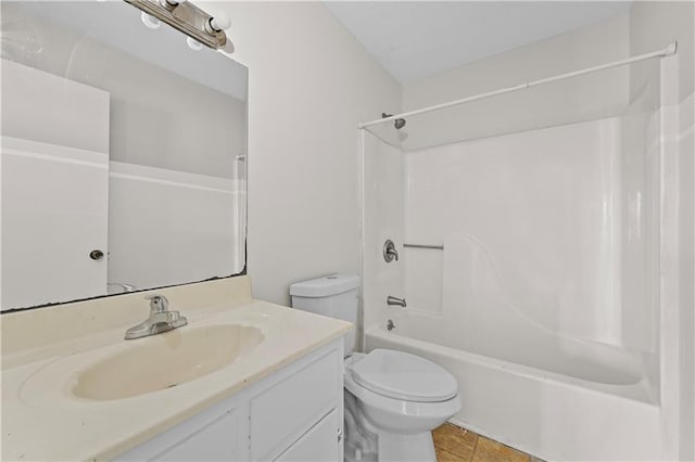 full bath featuring vanity, toilet, and shower / bathtub combination