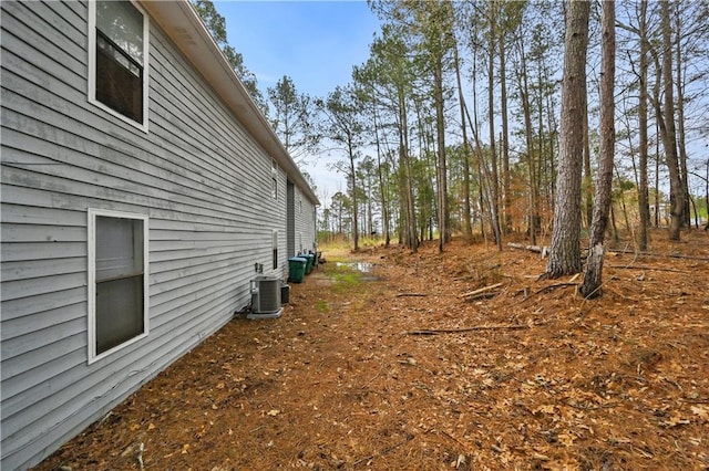 view of yard featuring central AC unit