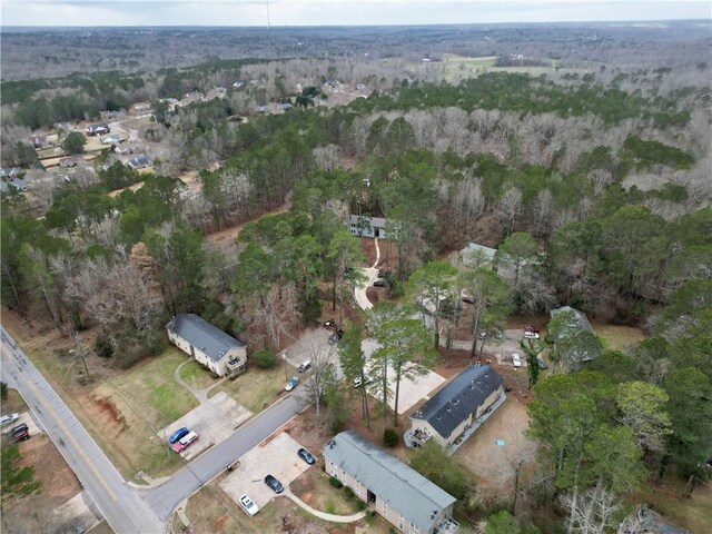 aerial view featuring a view of trees