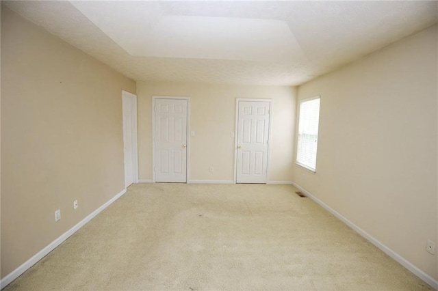 988 Vintage Pointe Dr, Lawrenceville, GA 30044 - unfurnished bedroom featuring baseboards and light colored carpet