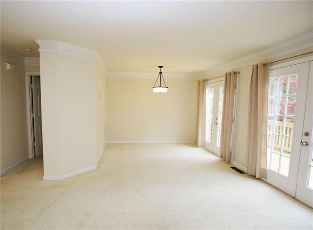 988 Vintage Pointe Dr, Lawrenceville, GA 30044 - spare room featuring light carpet, french doors, crown molding, and baseboards