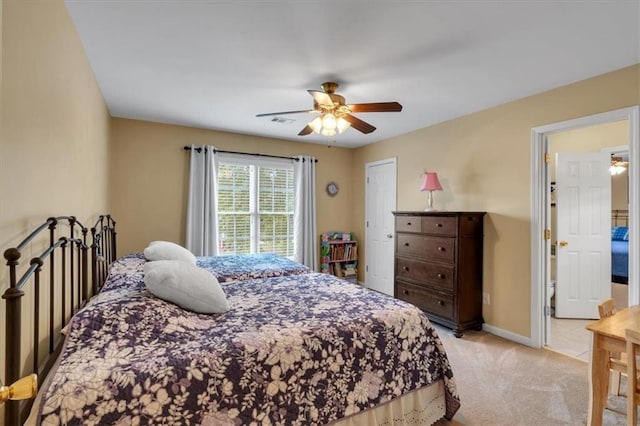 bedroom featuring baseboards, light colored carpet, ceiling fan, and visible vents