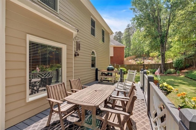 view of patio featuring fence and outdoor dining space