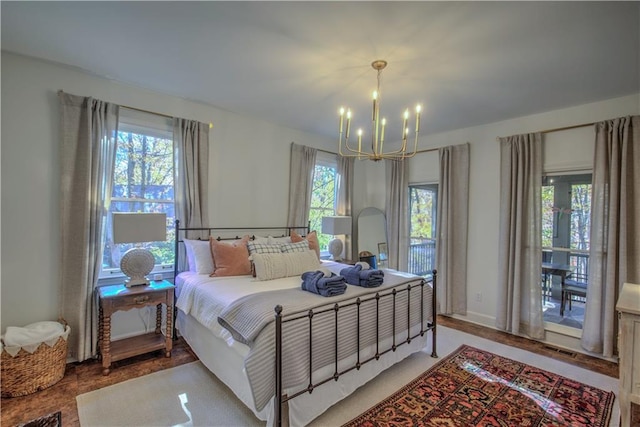 208 Trout Lily Trl, Big Canoe, GA 30143 - bedroom with a chandelier