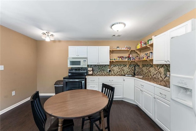 212 Postell Rd, Dallas, GA 30157 - kitchen with white appliances, open shelves, a sink, tasteful backsplash, and white cabinets
