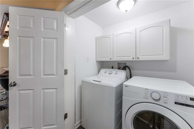212 Postell Rd, Dallas, GA 30157 - washroom featuring cabinet space and separate washer and dryer