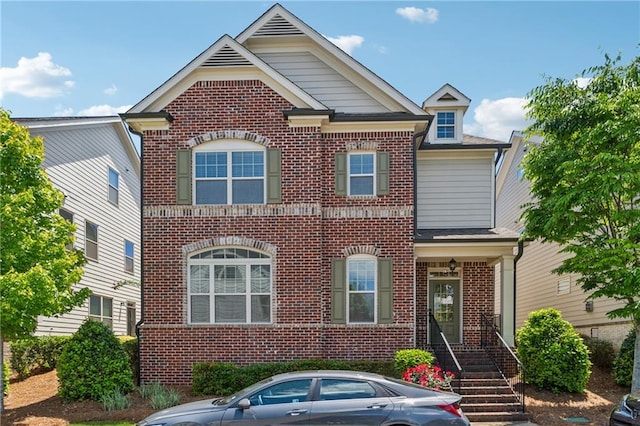 view of front of home with brick siding