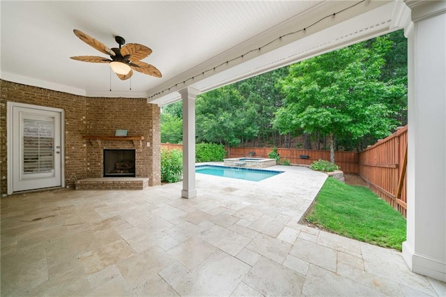 123 Meridian Dr, Woodstock, GA 30188 - fenced backyard with an outdoor brick fireplace, a patio, ceiling fan, and an in-ground hot tub