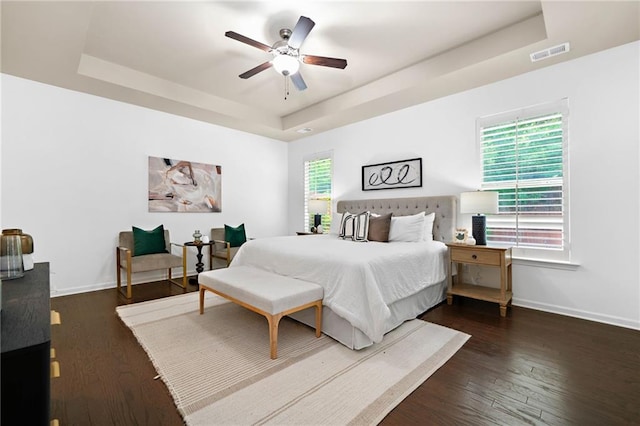 123 Meridian Dr, Woodstock, GA 30188 - bedroom with a raised ceiling, baseboards, and wood finished floors