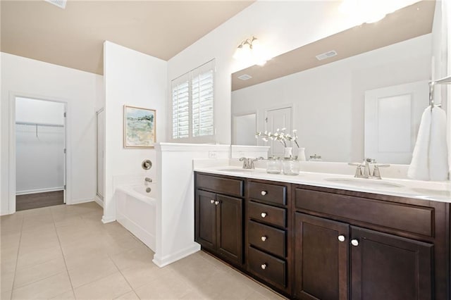 123 Meridian Dr, Woodstock, GA 30188 - full bathroom featuring double vanity, a bath, tile patterned flooring, a spacious closet, and a shower