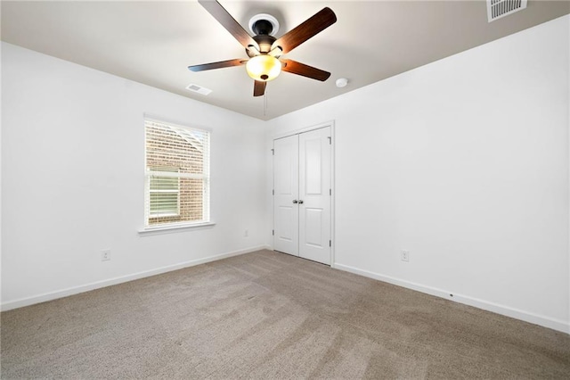 123 Meridian Dr, Woodstock, GA 30188 - unfurnished bedroom with baseboards, carpet floors, a ceiling fan, and a closet