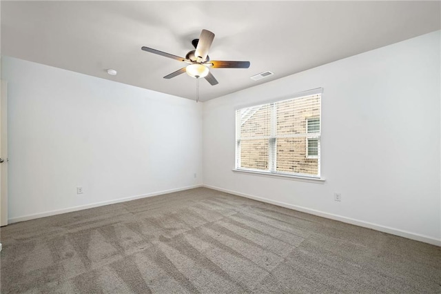 123 Meridian Dr, Woodstock, GA 30188 - empty room featuring a ceiling fan, carpet flooring, baseboards, and a smoke detector