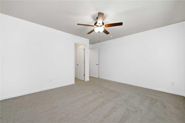 123 Meridian Dr, Woodstock, GA 30188 - spare room featuring ceiling fan, carpet flooring, and baseboards
